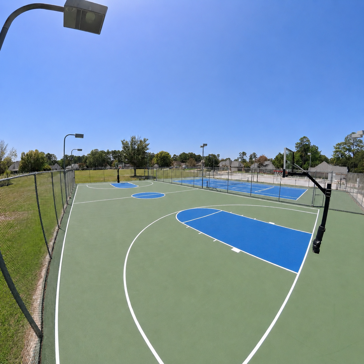 Basketball court beside the tennis court
